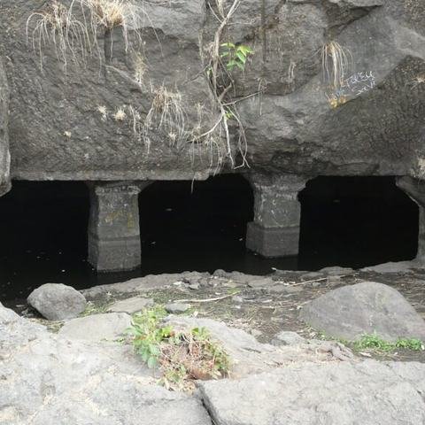 Ancient rock-cut cave entrance